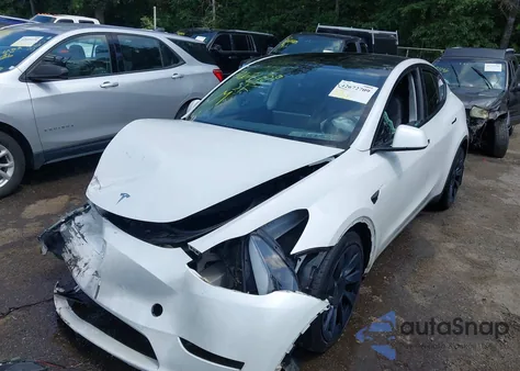 2023 Tesla Model Y z USA, uszkodzony, nr VIN 7SAYGAEE6PF709703